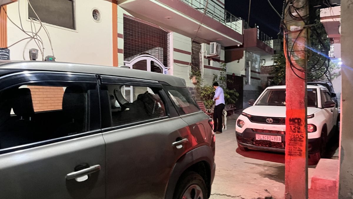 A driver struggles to manoeuvre and find parking space in Najafgarh, where roadside parking has become routine | Nootan Sharma, ThePrint