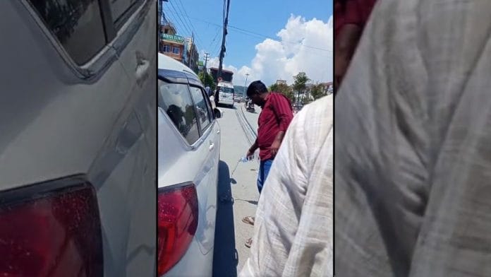 In the video, a Nepali citizen can be seen reprimanding the Indian tourists and making them clean the area they had spat on | Source: X, @iNikhilsaini