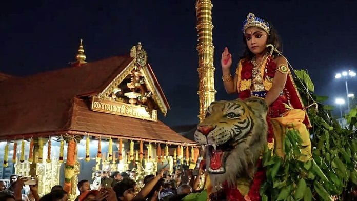 A child dressed as Lord Ayyappa at Karpoorazhi procession, organised by the Travancore Devaswom Board at Sabarimala. | Commons