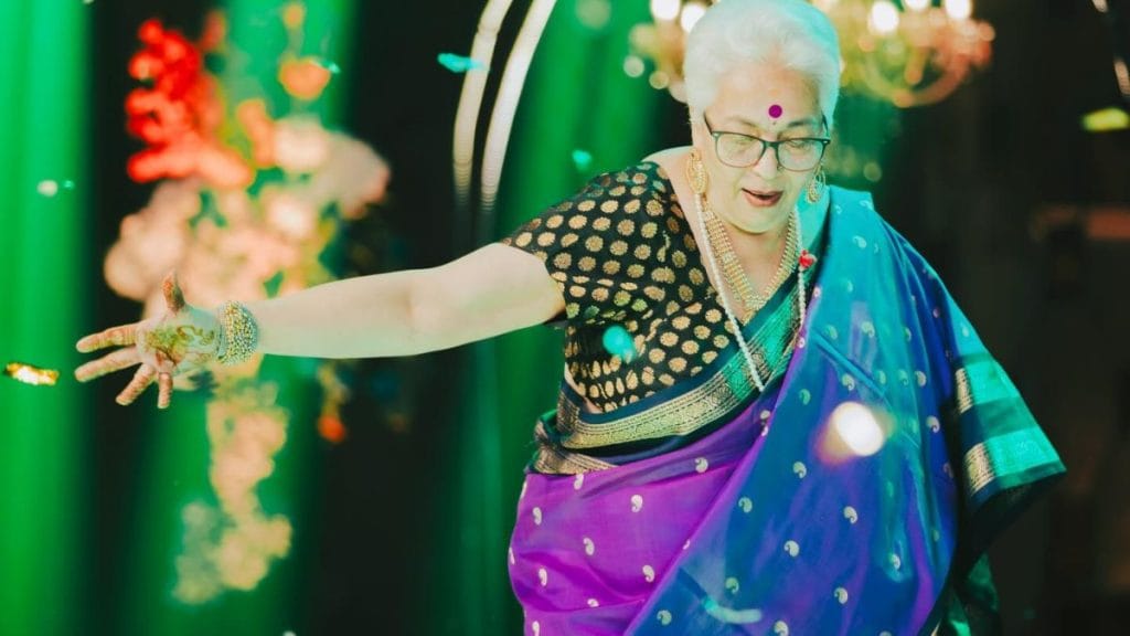 Kalpana Iyer dancing at 69 in a saree at a wedding. Image: @kalpanaiyer/Instagram