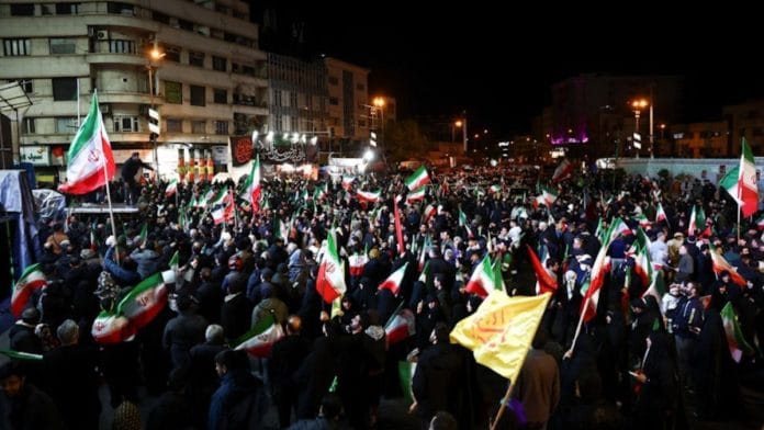 Iranians take to the streets in Tehran after the announcement of ceasefire | Majid Asgaripour/WANA via Reuters