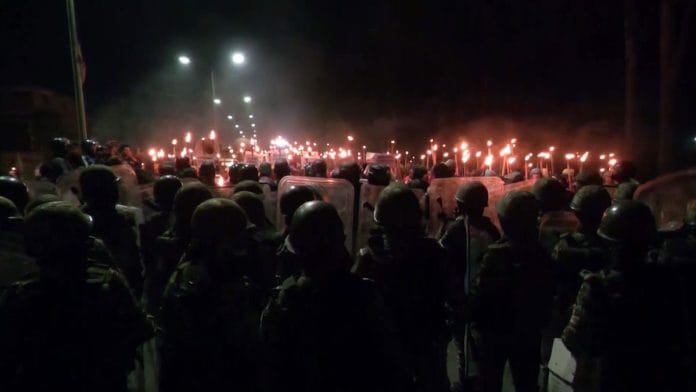Representational image | Security personnel stand guard at a protest rally in Imphal East Sunday | ANI