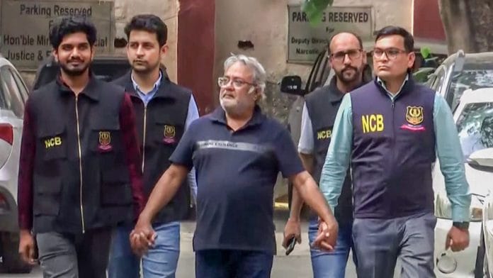 Narcotics Control Bureau officials take custody of wanted drug trafficker Mohammed Salim Dola at Delhi Airport. Dola was brought back from Turkey under 'Operation Global-Hunt' | ANI