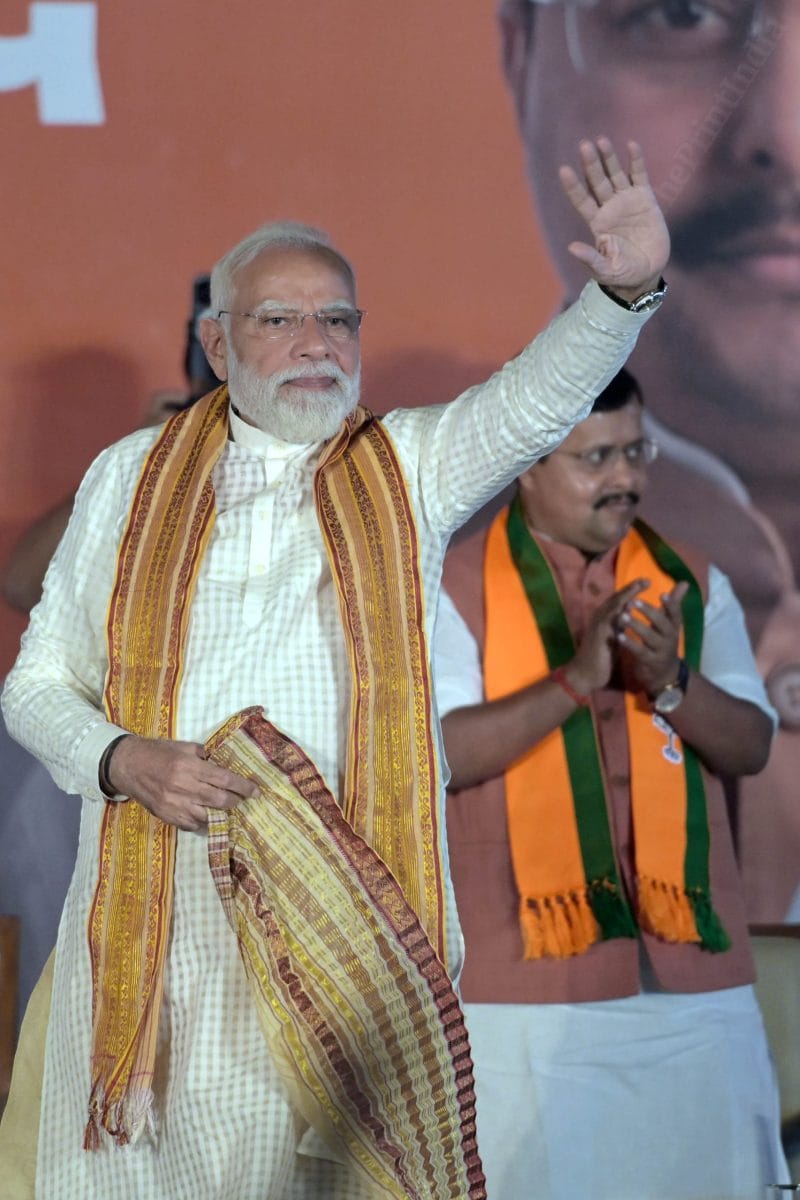 PM Modi waves to the crowd after delivering his speech | Suraj Singh Bisht | ThePrint