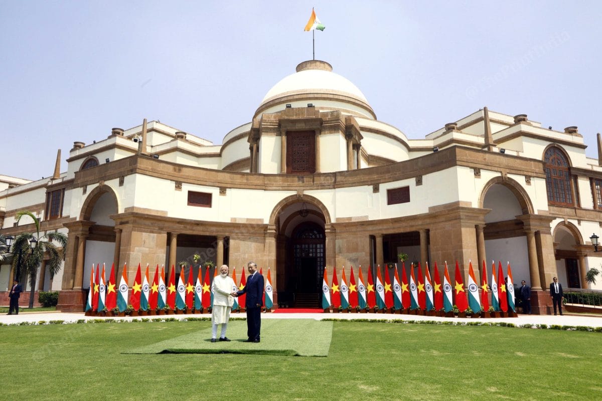 Prime Minister Narendra Modi shakes hand with Vietnam's President To Lam before their meeting at the Hyderabad House in New Delhi | Praveen Jain | ThePrint
