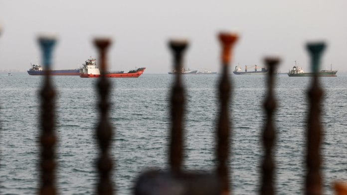 Vessels in the Strait of Hormuz are visible near the beach of Bandar Abbas, Iran, May 22, 2026. | Majid Asgaripour/WANA (West Asia News Agency) via REUTERS