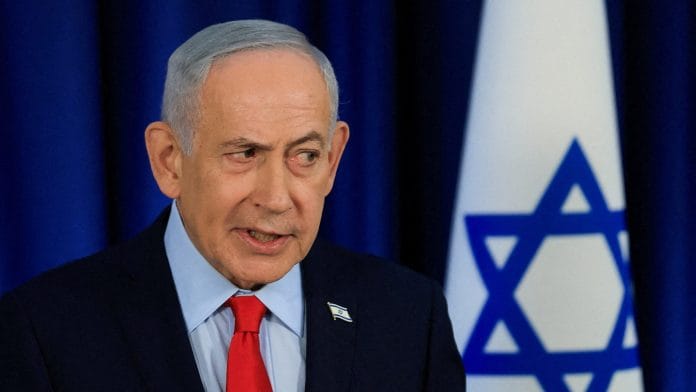 Israeli Prime Minister Benjamin Netanyahu speaks during a press conference, amid the U.S.-Israel conflict with Iran, in Jerusalem, March 19, 2026. | REUTERS/Ronen Zvulun/File Photo