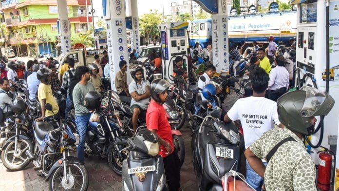 A large crowd of people on two-wheelers queues up at a Bharat Petroleum pump amid fuel shortage and price hike concerns, in Bhubaneswar on Friday | ANI
