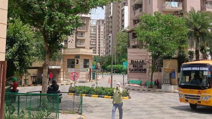 The main entrance of Emaar Palm Gardens in Sector 18, Gurugram | Almina Khatoon, ThePrint