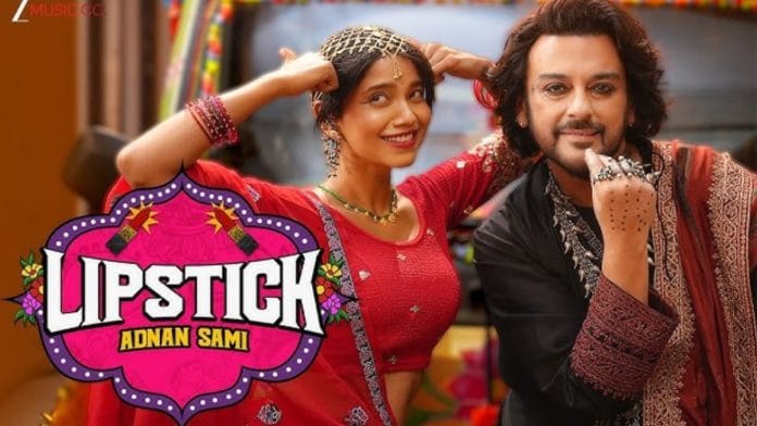 In the music video, singer Adnan Sami appears in an all-black outfit, with curly hair and silver jewellery alongside actor Bhagyashree Limaye | Source: YouTube, Zee Music Company