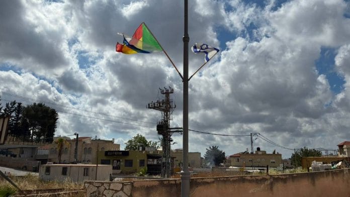 A Druze flag with an Israeli flag in Julis, Israel | Keshav Padmanabhan | ThePrint