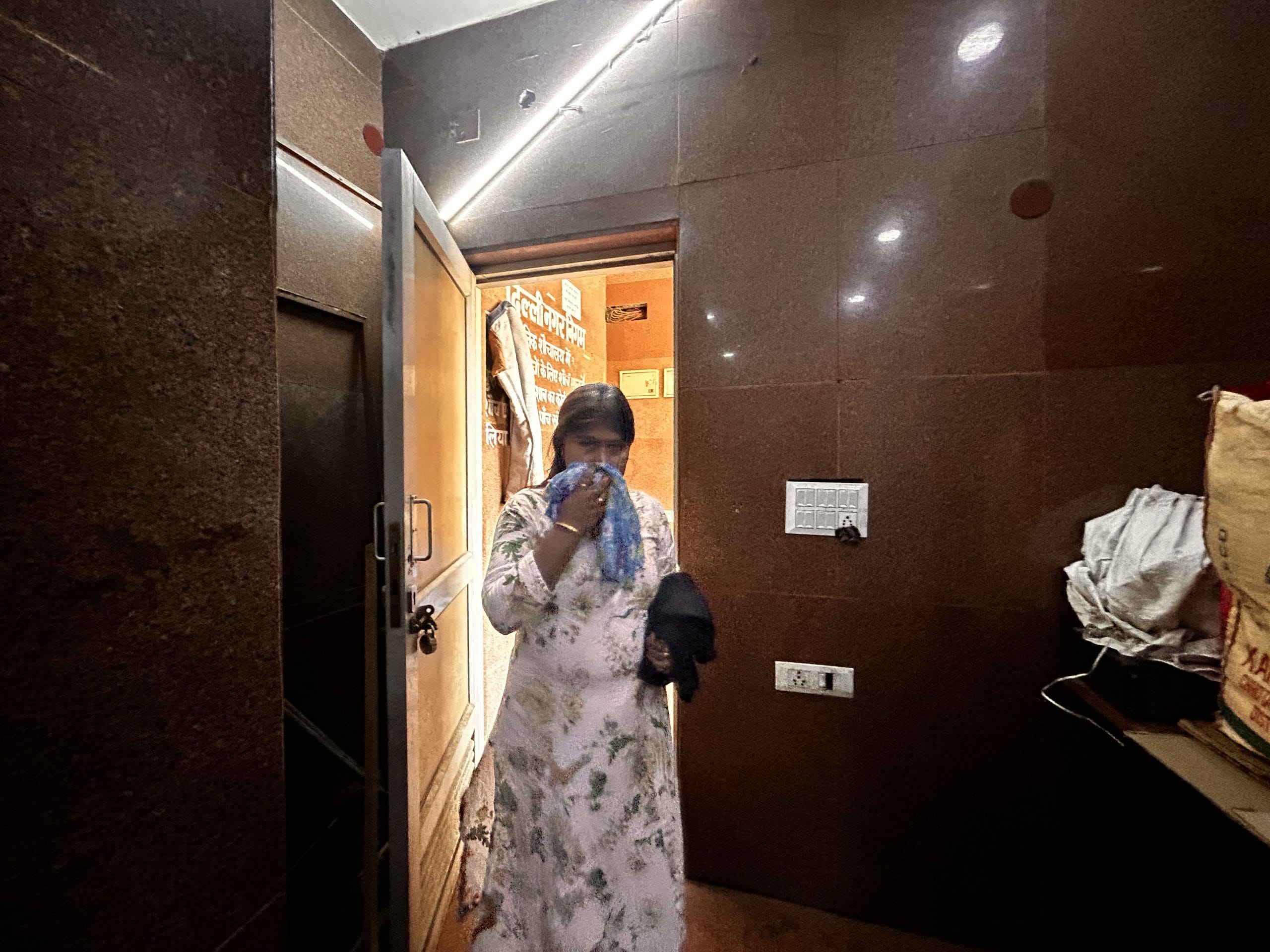 Janaki enters the washroom with her face covered| Manisha Mondal, ThePrint