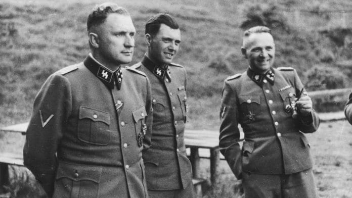 Josef Mengele (centre) in 1944, with Richard Baer (left), commandant of Auschwitz, and Rudolf Hoess, former Auschwitz commandant | Commons
