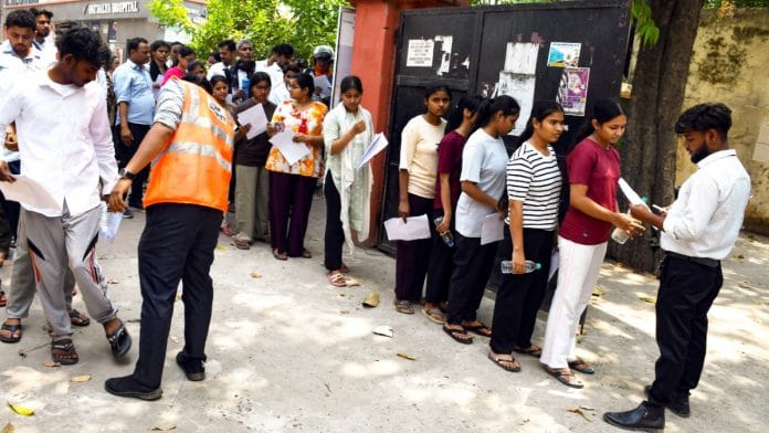 Representational | Aspirants undergo security check before appearing for NEET (UG) at an exam centre in Prayagraj on 3 May 2026 | ANI