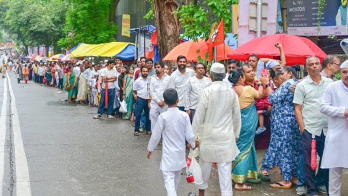 Representational | Devotees waiting in queue to offer prayers to Lord Vithoba and Goddess Rakhumai on the occasion of 'Ashadhi Ekadashi', at Prati Pandharpur temple, Wadala in Mumbai, on 6 July 2025 | ANI
