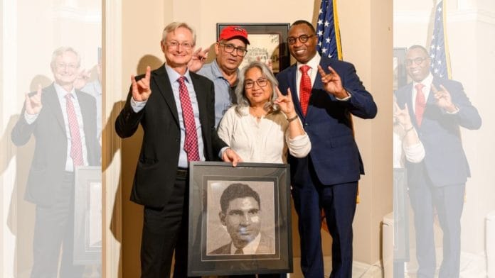 Anil and Marilyn Kochhar with the photo of Anil's father, Prakash Chand Kochhar