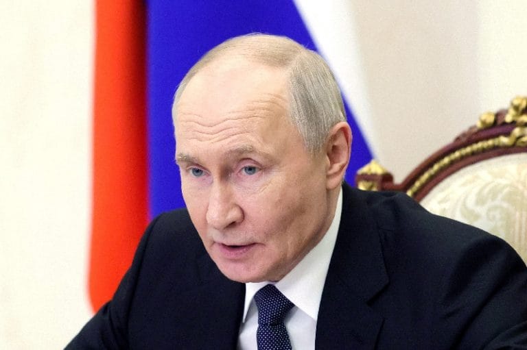 Putin says Russia, China ready to back each other on issues such as protecting sovereignty