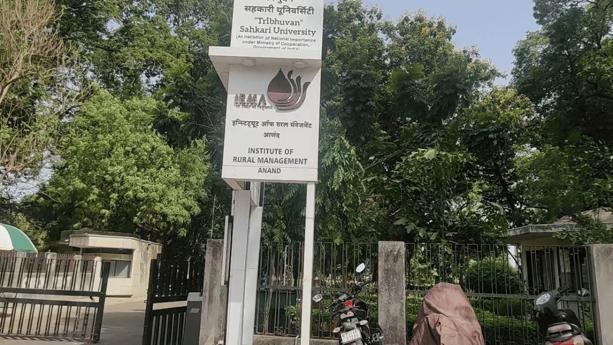 The university entrance with two boards showing the names of Institute of Rural Management Anand (IRMA) and Tribhuvan Sahkari University (TSU) | Vrinda Tulsian | ThePrint