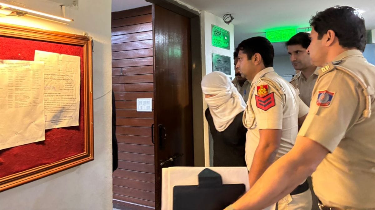 The Delhi rape-murder accused Rahul Meena being brought to Saket District Courts. Police say Meena decided to rob the family where he was employed because he was in lakhs of debt due to addiction to online betting | Photo: By special arrangement 