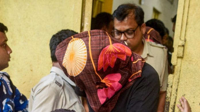 Police escort one of the suspects arrested in connection with the murder of Chandranath Rath, personal assistant to West Bengal Chief Minister Suvendu Adhikari, at a Barasat court in North 24 Parganas district | Photo: PTI