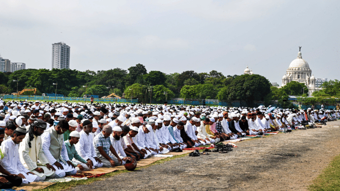 People offer prayers on the occasion of Eid ul-Adha at Brigade Parade Ground, in Kolkata on Thursday | PTI