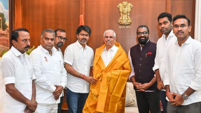 TVK chief Vijay meets Tamil Nadu Governor Rajendra Arlekar to stake claim to form the government at Lok Bhavan, in Chennai on Friday. | ANI