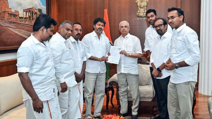 File photo of TVK chief Vijay meeting Tamil Nadu Governor Rajendra Arlekar on Wednesday. | ANI