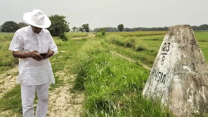 BJP MLA Chitta Mukherjee stands near the India-Bangladesh border as West Bengal government hands over 27 km of land to BSF for border fencing, in Murshidabad on Thursday | ANI