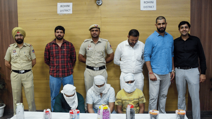 The Rohini district operation cell of Delhi Police with arrested members of the inter-state heroin drug syndicate, at the PHQ Media Center, in New Delhi on Friday | ANI