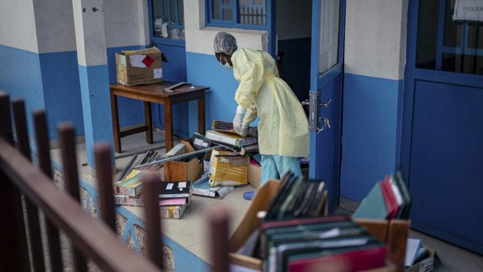 Staff members at CBCA Virunga Hospital prepare rooms intended for possible suspected Ebola cases in Goma, on May 17 Photographer: Jospin Mwisha/AFP/Getty Images