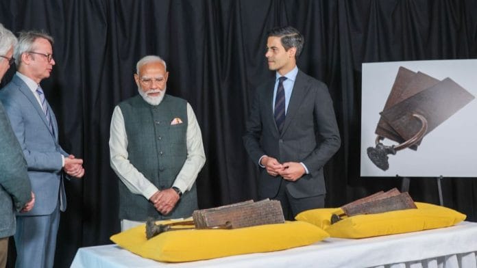Prime Minister Narendra Modi along with other Dutch government officials at the the handover ceremony of Leiden Plates in Hague, Netherlands, on 16 May | Source: X, @narendramodi