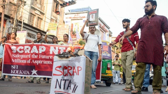 Members of the Students’ Federation of India stage a protest against NTA. | Representational image | ANI