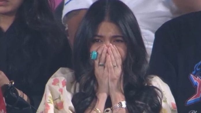 Anushka Sharma was spotted wearing a teal digital tally counter on her finger during an IPL match. | X