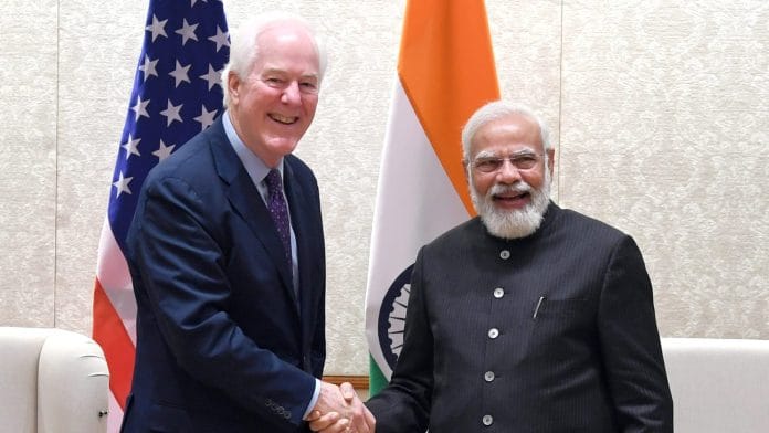 New Delhi, Nov 13 (ANI): Prime Minister Narendra Modi meets Senator John Cornyn who led the United States Congressional Delegation, in New Delhi on Saturday. (ANI Photo)