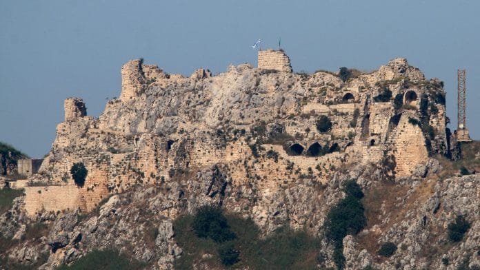 An Israeli flag and a flag of the Golani Brigade fly on Beaufort Castle, as seen from Marjayoun, southern Lebanon, June 1, 2026. | REUTERS/Stringer