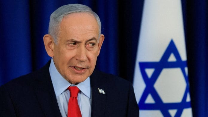 FILE PHOTO: Israeli Prime Minister Benjamin Netanyahu speaks during a press conference, amid the U.S.-Israel conflict with Iran, in Jerusalem, March 19, 2026. REUTERS/Ronen Zvulun/File Photo