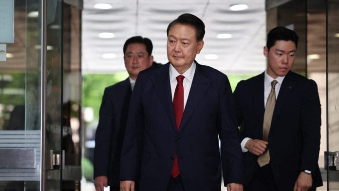Former South Korean President Yoon Suk Yeol arrives at a court to attend a hearing to review his arrest warrant requested by special prosecutors in Seoul, South Korea, July 9, 2025. | REUTERS/Kim Hong-Ji/Pool