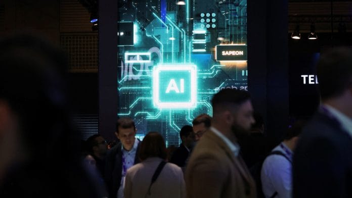 People walk near a sign for Sapeon, an artificial intelligence (AI) chip company, at the Mobile World Congress (MWC) in Barcelona, Spain, February 27, 2024. | REUTERS/Bruna Casas