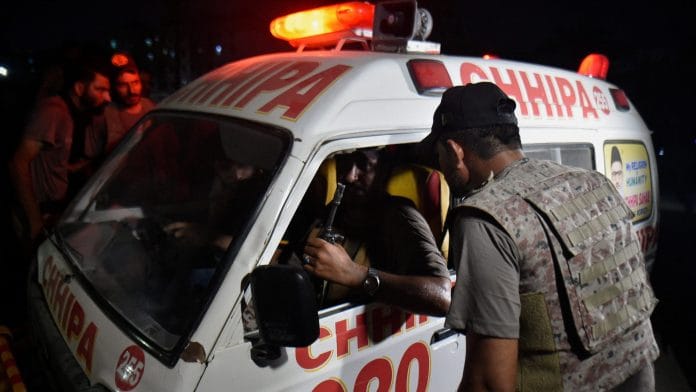 An ambulance carrying the body of a victim leaves after an explosion and gunfire were reported, near offices of the Rangers, a paramilitary force, in Karachi, Pakistan, June 27, 2026. REUTERS/Qaiser Khan