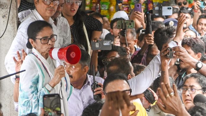 Former West Bengal CM and TMC chief Mamata Banerjee addresses a protest rally at Esplanade, in Kolkata on Tuesday. ANI Photo