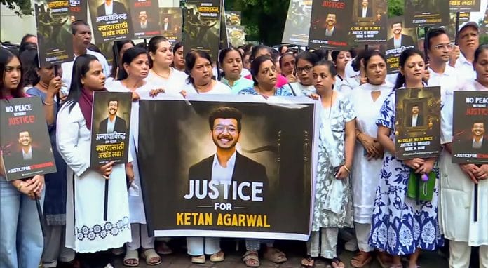 Pune, Jun 27 (ANI): Ketan Agarwal's family members and society residents hold a candlelight march at Pimpri-Chinchwad to pay tribute to him, in Pune on Saturday. (ANI Video Grab)