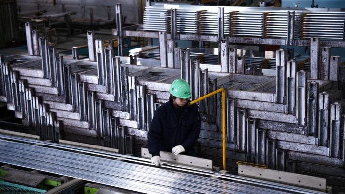 Aluminum extrusions at the Kato Light Metal Industry Co. factory in Kanie, Japan. Photographer: Louise Delmotte | Bloomberg