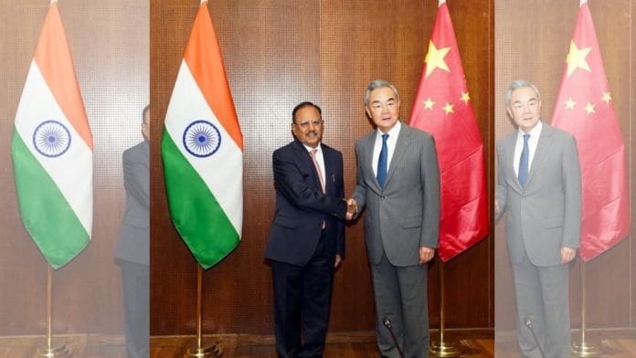 NSA Ajit Doval and China FM Wang Yi on the sidelines of the BRICS NSAs’ Meeting, in New Delhi | Source: @MEAIndia X/ANI