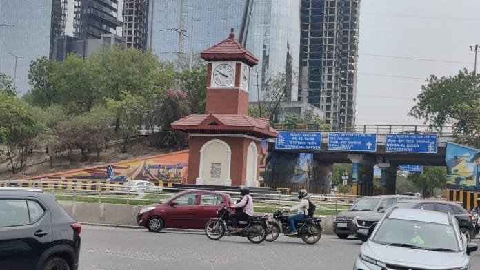 The 25-foot-tall clock tower in Sector 128 stands at the centre of a roundabout near the Hajipur underpass on the Noida-Greater Noida Expressway | Almina Khatoon | ThePrint