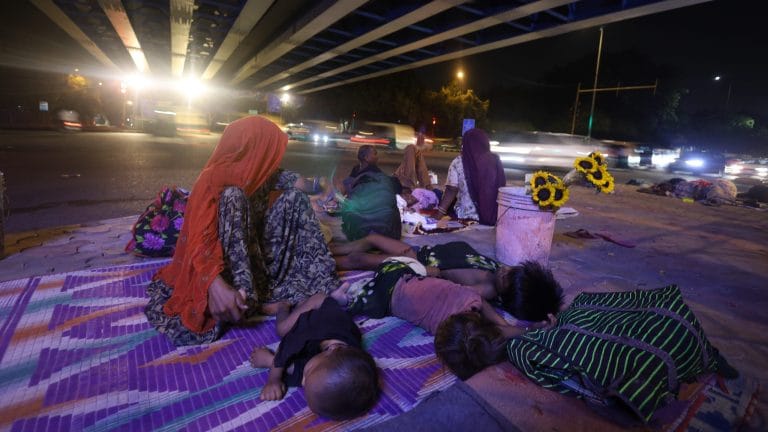 On Delhi’s pavements, women sleep in shifts. Survival leaves little room for rest