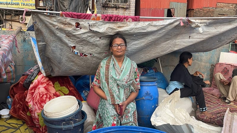 Nazneen Ansari waits for her husband to return home as she sits in front of the demolished Garib Nagar hutments | Kasturi Walimbe/ThePrint