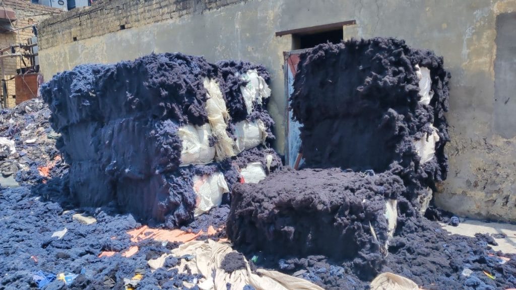 Shredded textile waste awaiting to be processed into yarn. Vitasta Kaul | ThePrint
