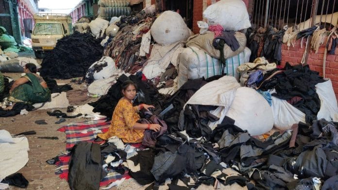 Women workers are primarily engaged in sorting and shredding textiles during the recycling process. Vitasta Kaul | ThePrint
