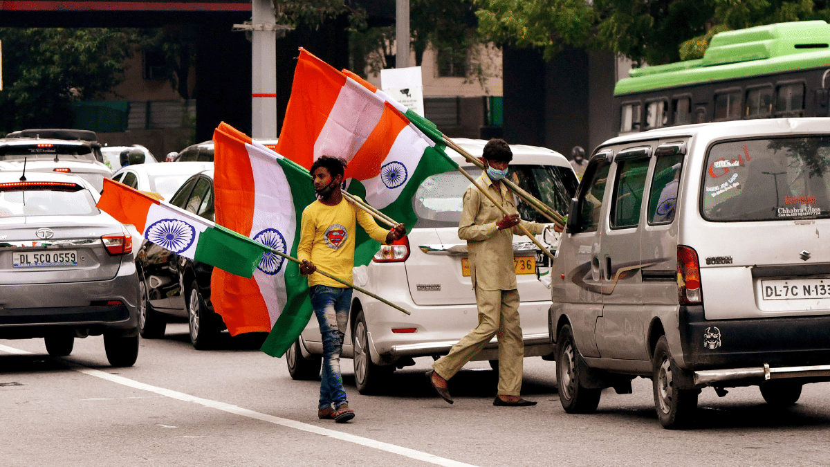 Representational image. | Street vendors selling tricolor flag at traffic red light on the eve of independence day in New Delhi. | ANI file 