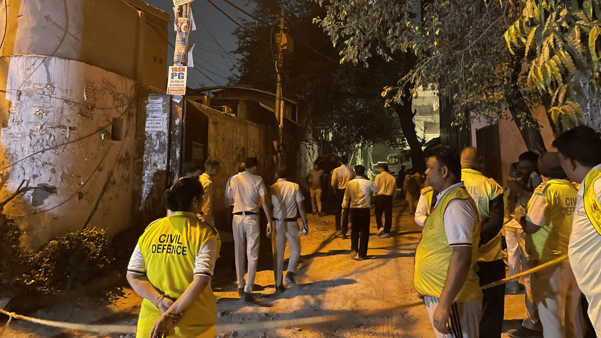 Civil defence and police personnel on their way to the site of collapse | Alisha Dutta | ThePrint